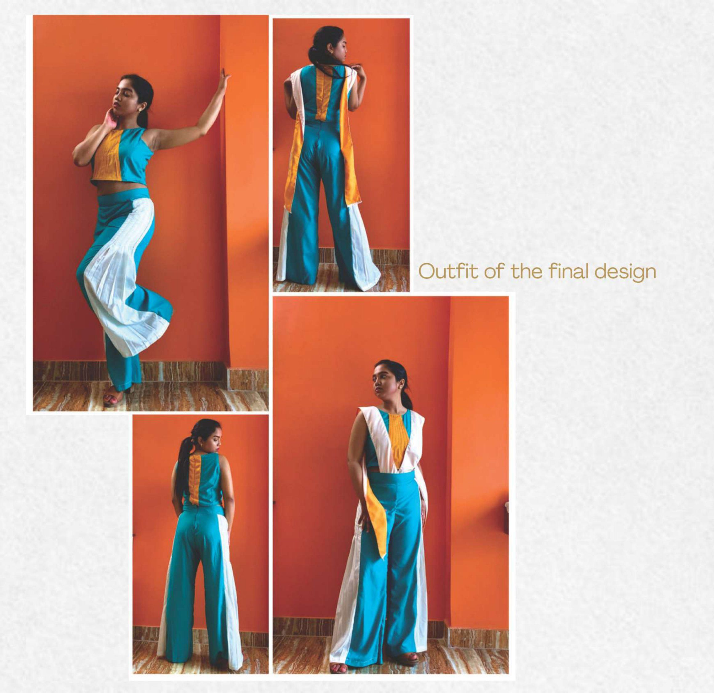 Etosha wearing the made outfit from Archiplex: teal and white wide trousers with an orange and teal top, against an orange wall
