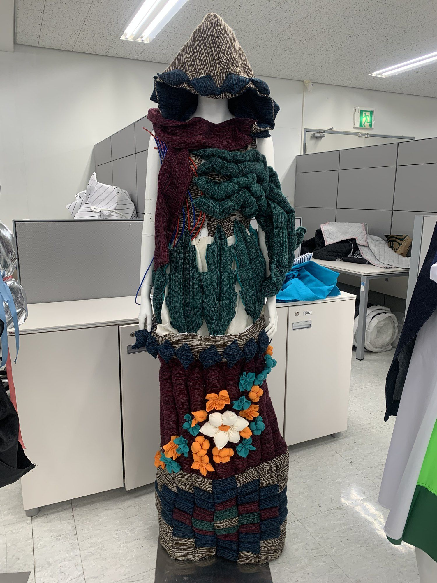 Heavily textured crochet garment on a mannequin