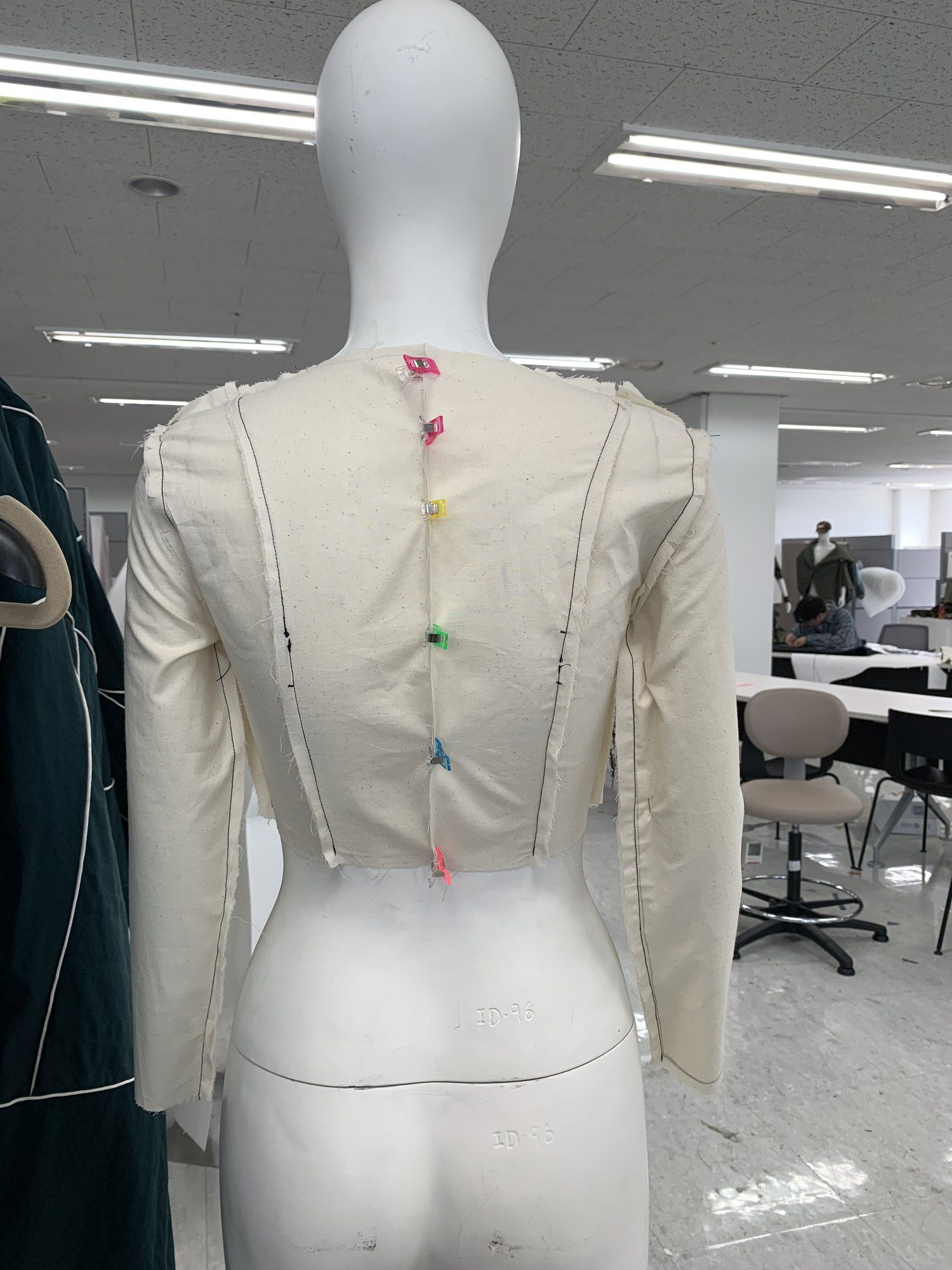 Calico toile of a cropped jacket, back